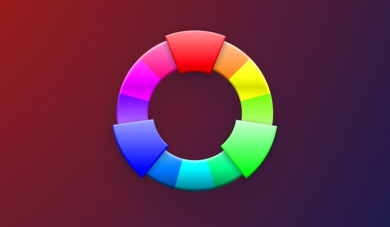 A twelve-segment colour wheel rendered in soft 3D, two segments pulled outward, on a dark red-to-purple gradient.